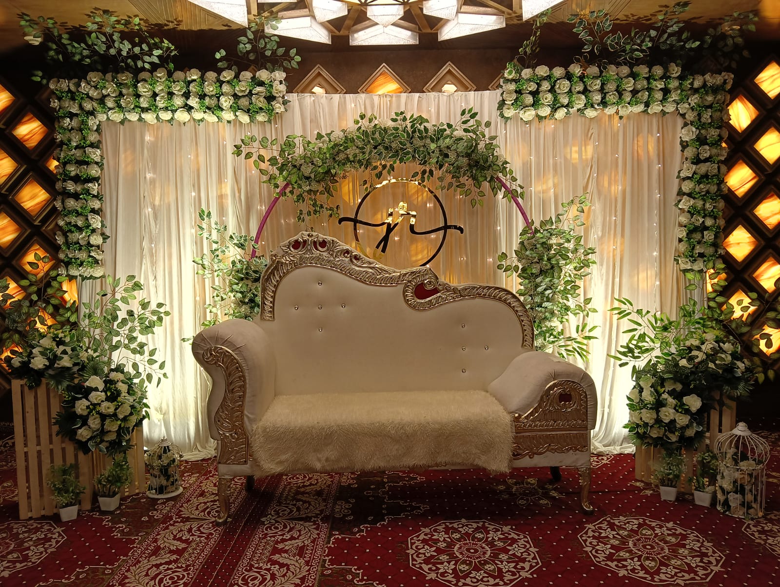 White Drape Greenery Arch Stage