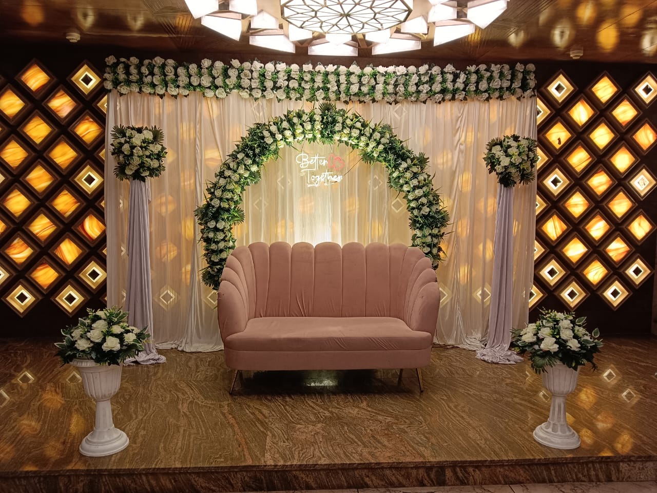 Blush Sofa Greenery Arch Stage